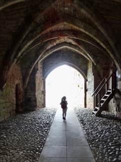 Little girl exploring a castle