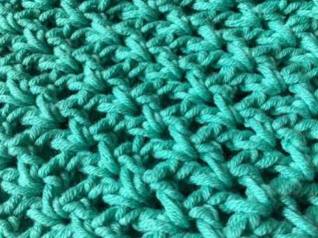 teal coloured crochet stitches - close up